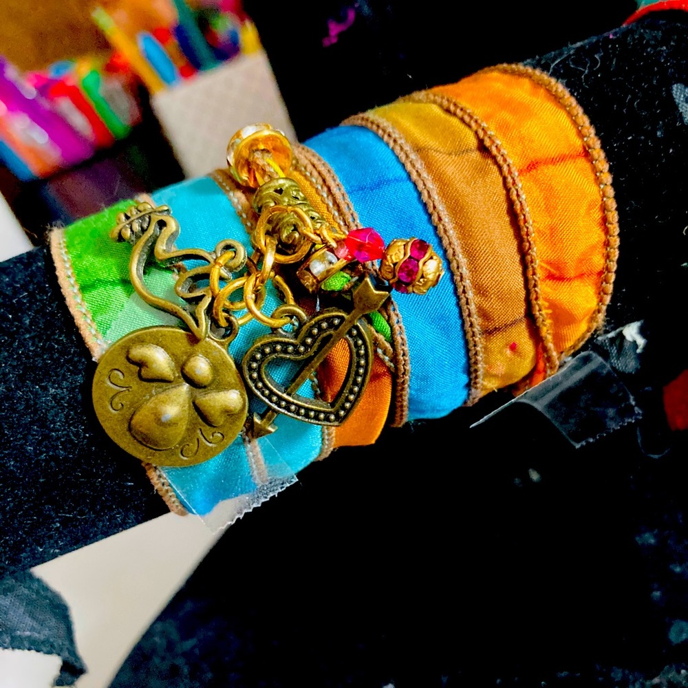 Silk wrap bracelet with charms